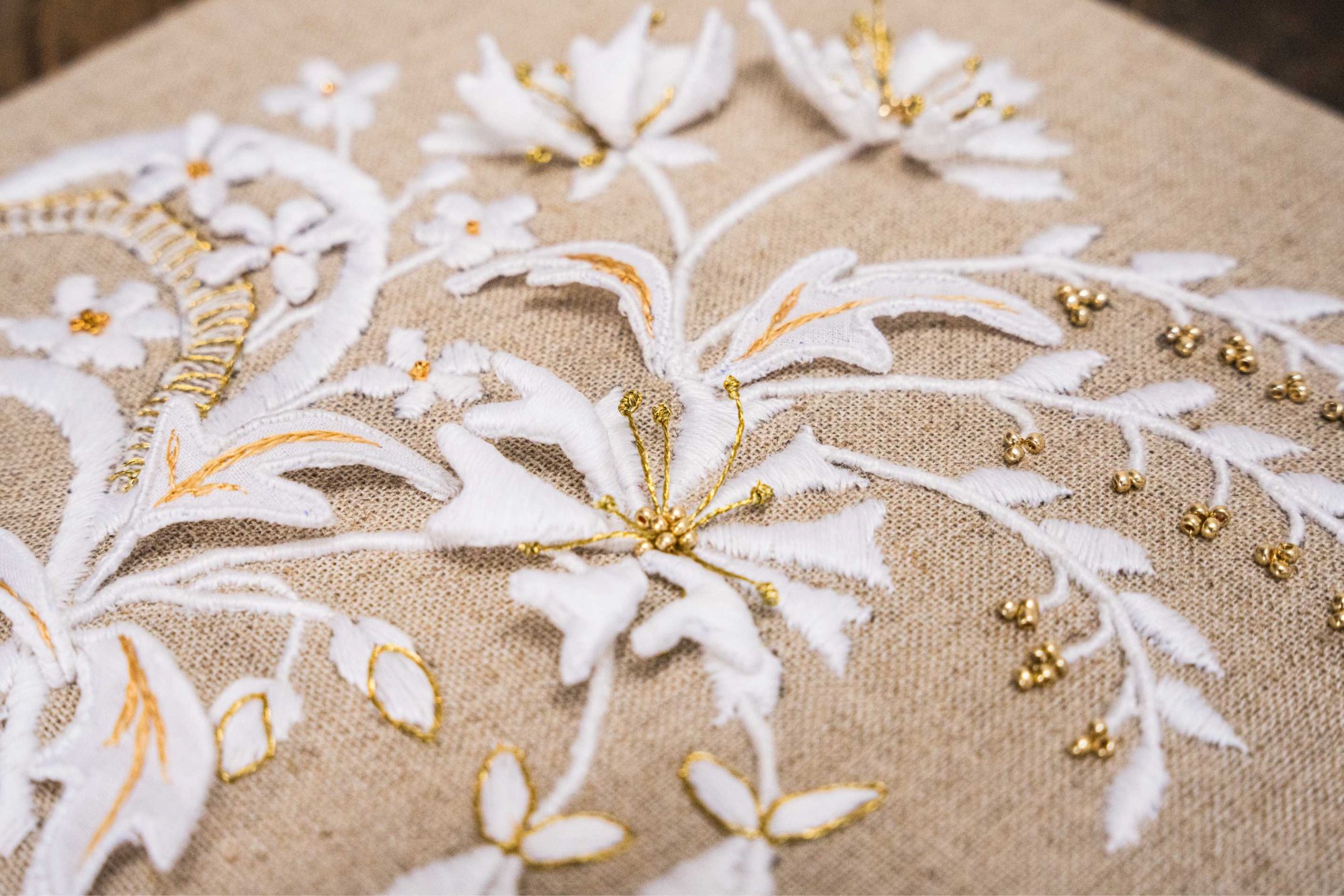Wired whitework petals with goldwork stamens and bead sprays